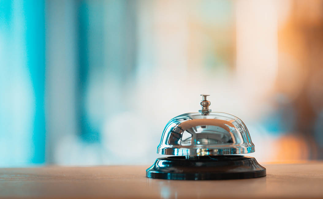 Bell on counter for service with blurred background