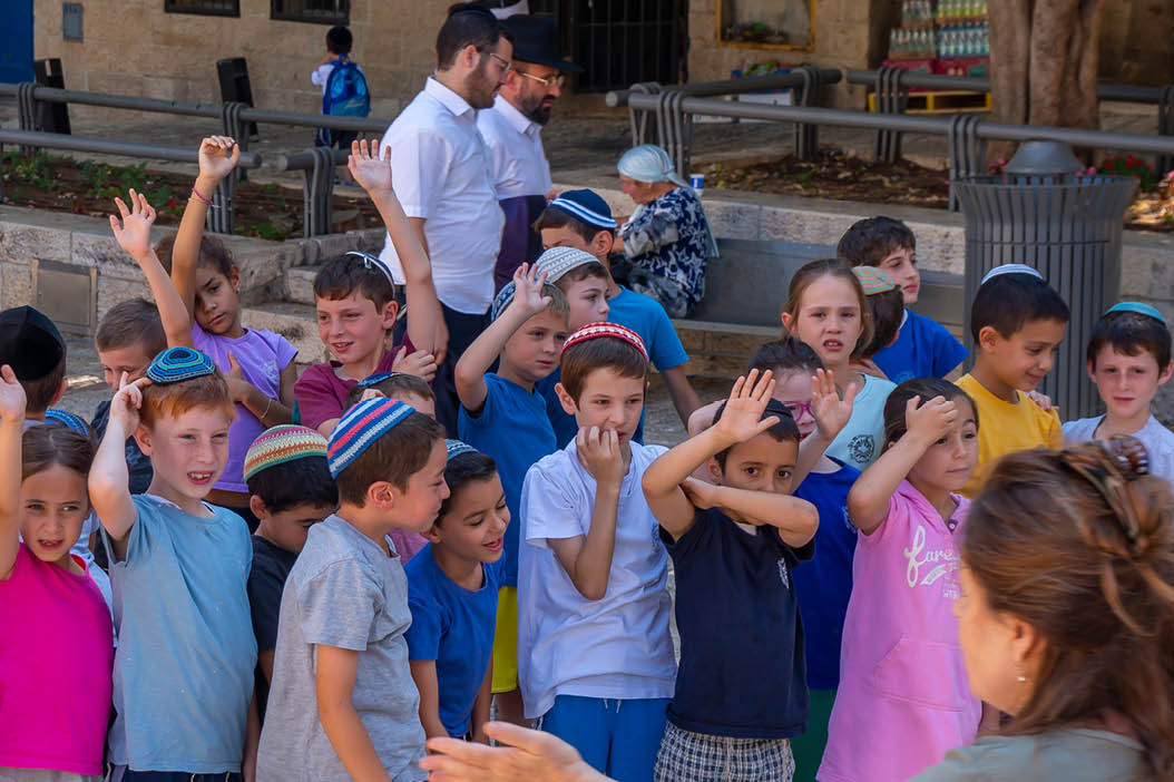 Jerusalem, Israel - June 2019: Jewish children playing on the streets of the old city in the Jewish quarter of Jerusalem