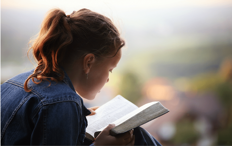 A woman is reading a book. AI generated content